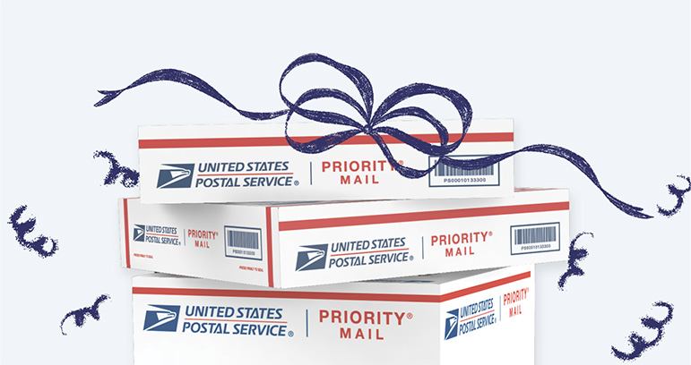 Stacked Priority Mail boxes with a festive bow appearing on top.
